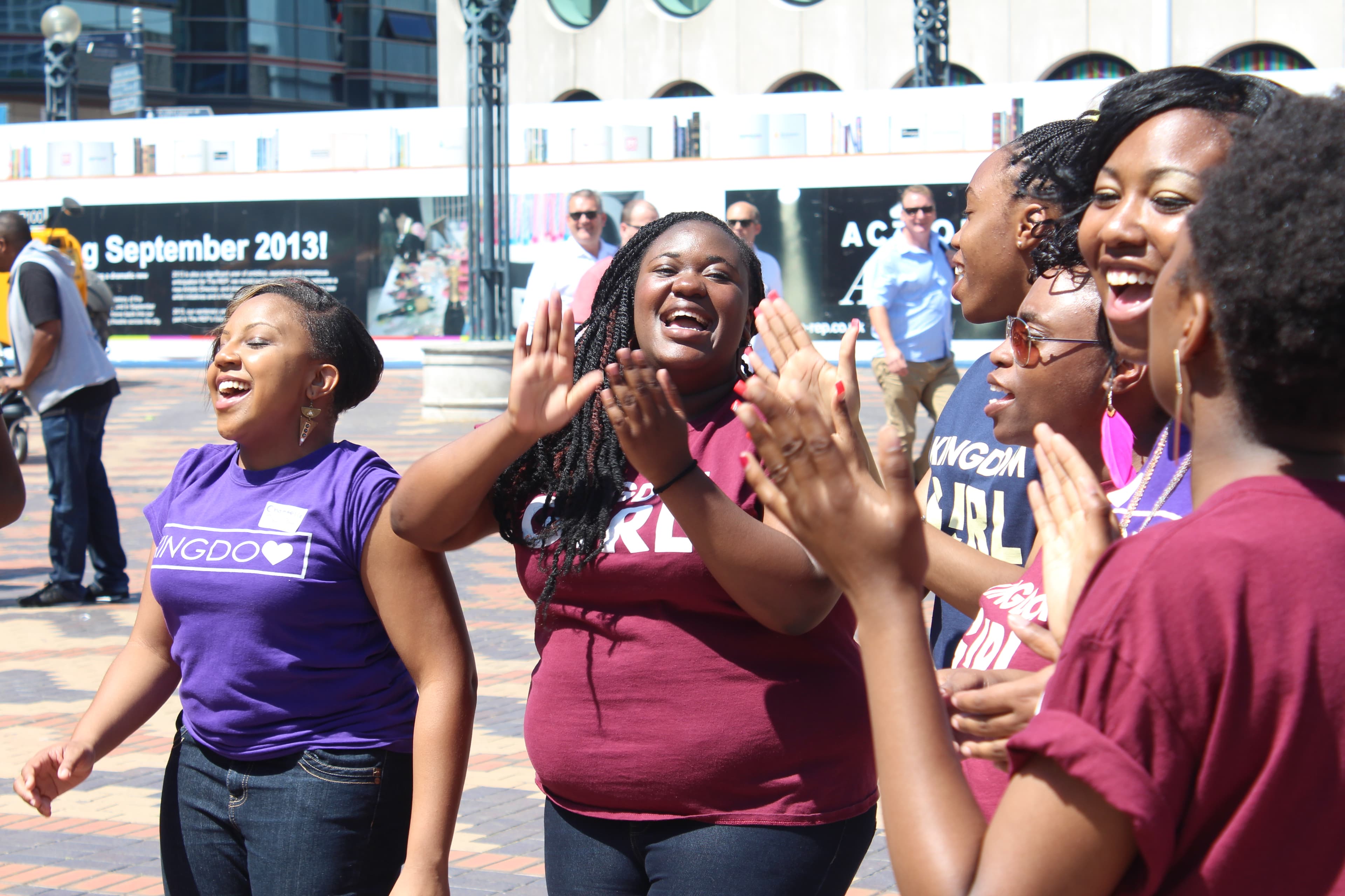 A community choir singing together outdoors
